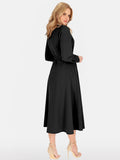 Robe Élégante Noire Ornée d'une Broche 52%Coton